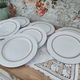 Set of 7 Limoges porcelain dinner plates from Maison Charles Ahrenfeldt