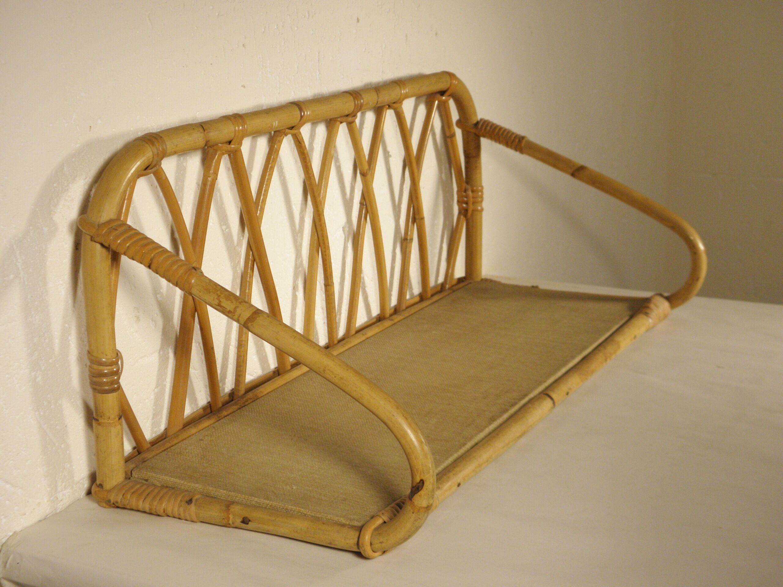 Rattan wall shelf