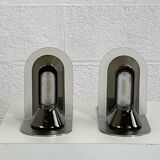 Pair of vintage stainless steel and glass wall lights