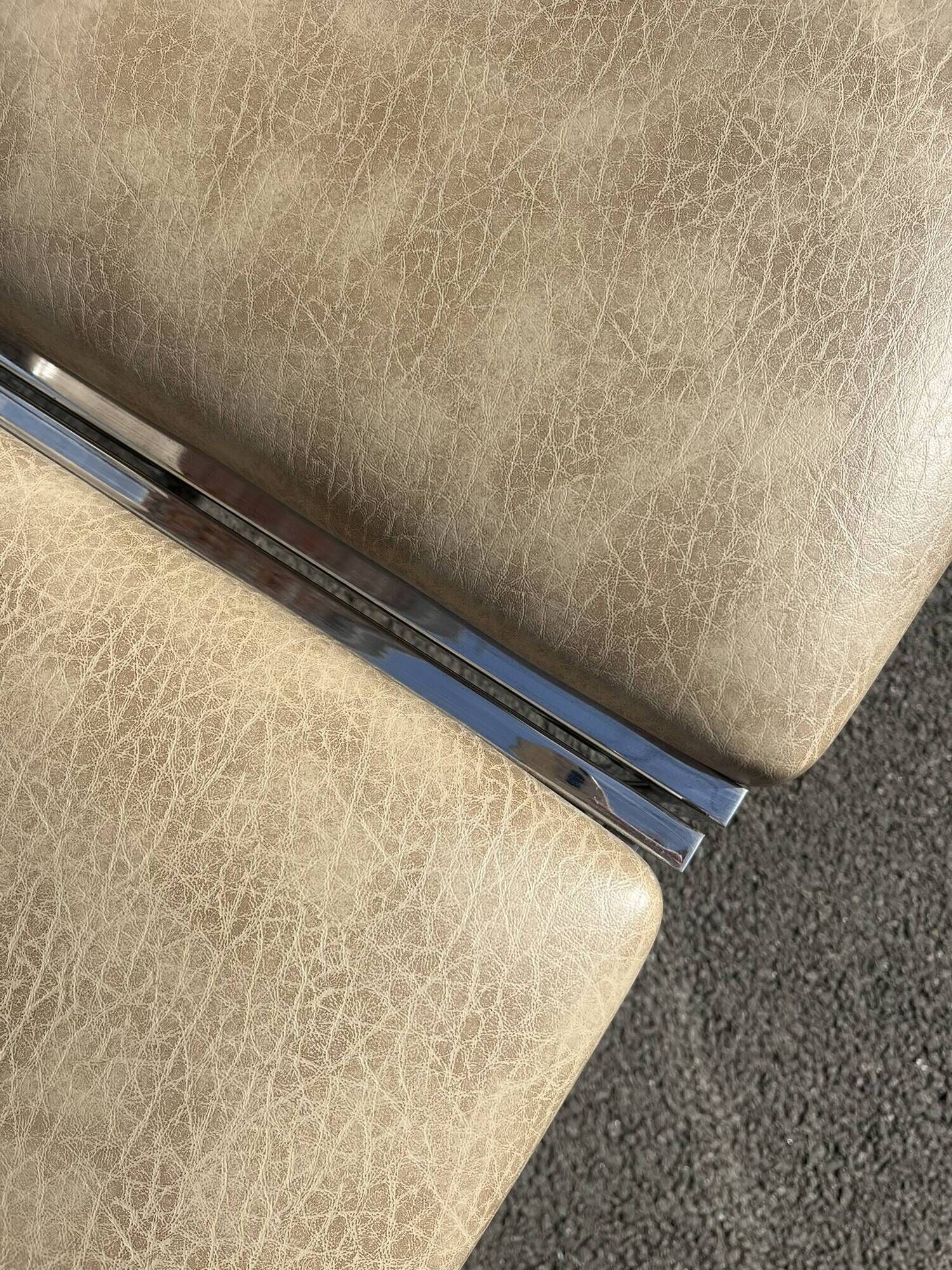 Set of 4 vintage chairs in chrome and faux leather.