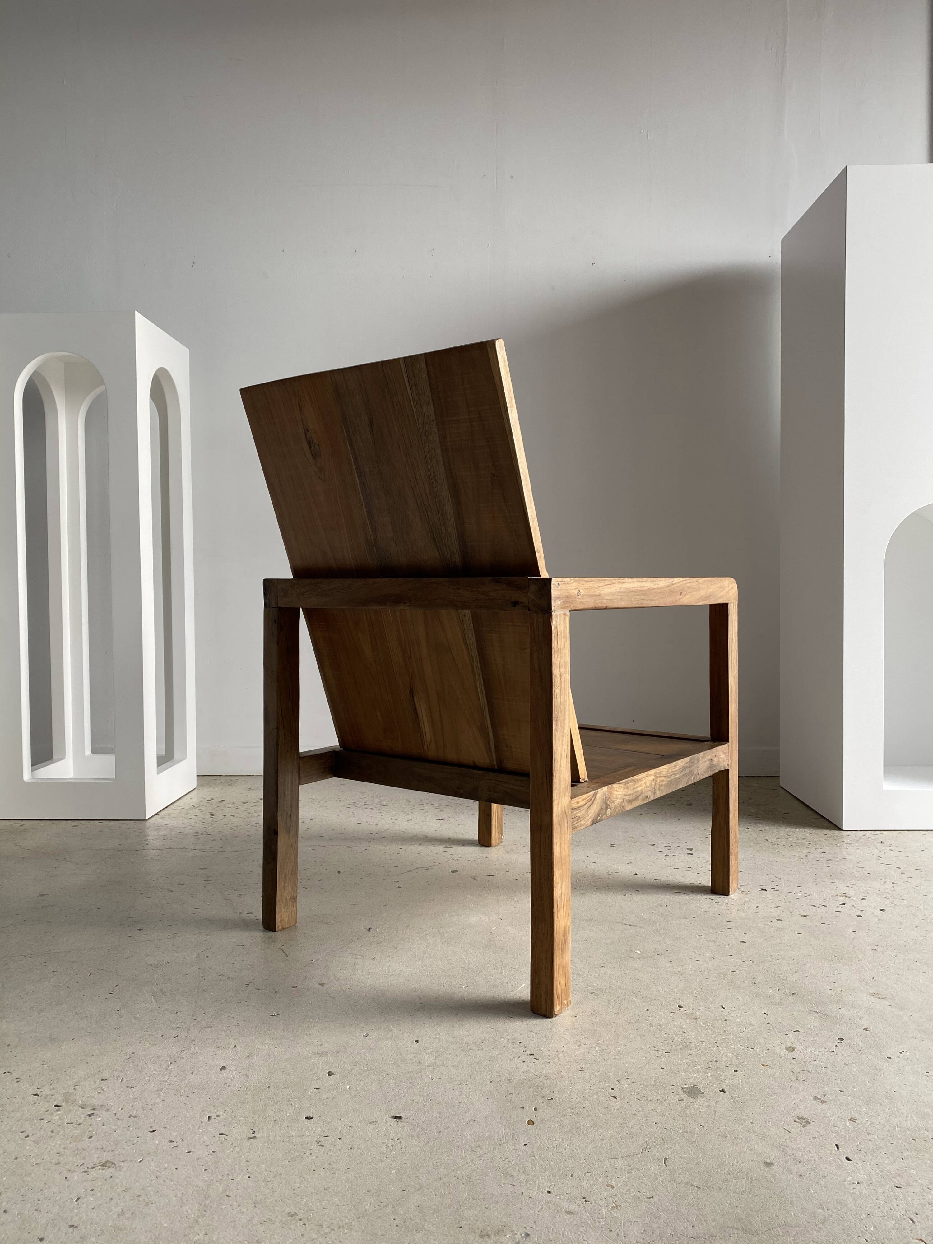 Armchair in natural wood (teak) minimalist design