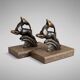 Art Deco bookends in patinated metal – animal pair – marble bases