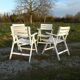 Four vintage wooden garden armchairs from the 1950s