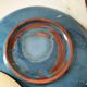 Set of 6 cream and grey-blue glazed earthenware plates.