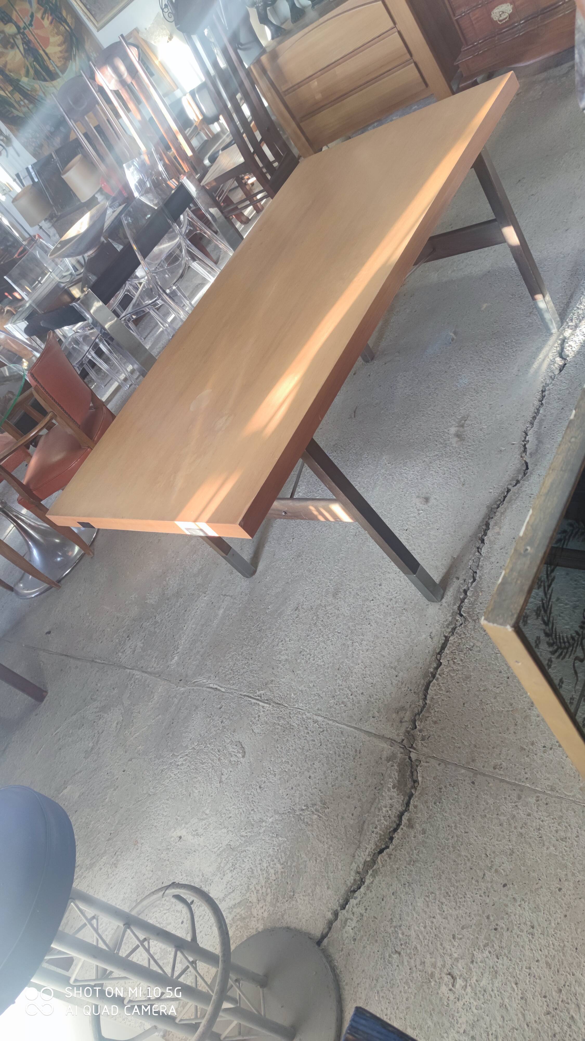 Extendable dining table in walnut, mahogany and chrome, circa 1960