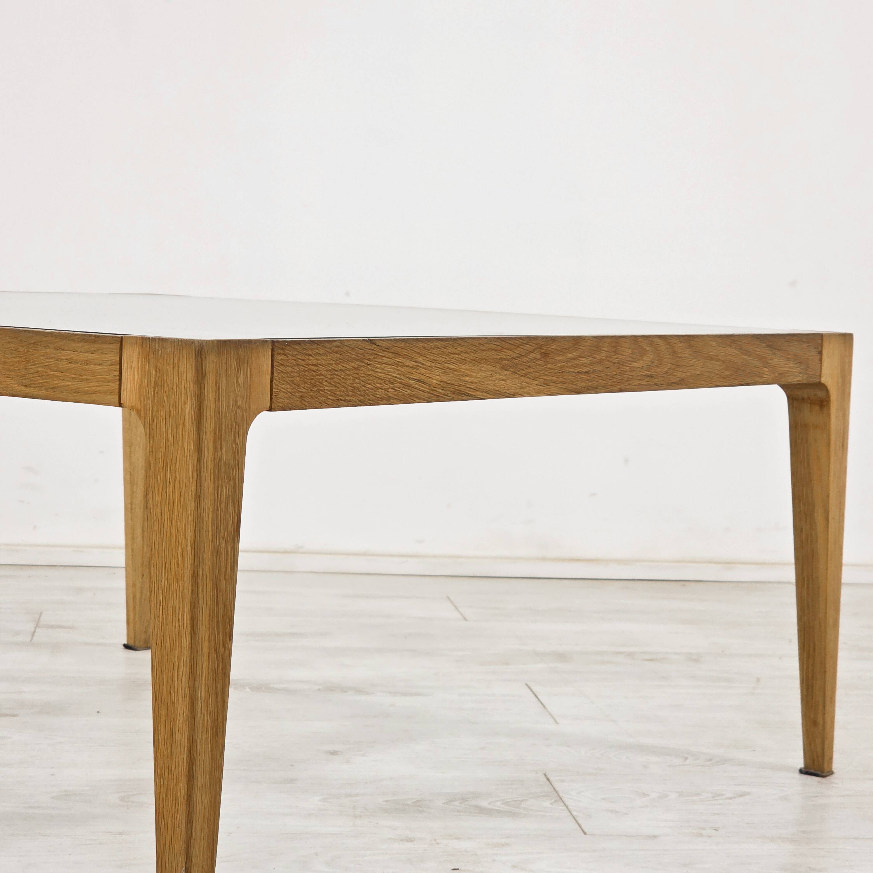 Scandinavian design coffee table in oak and glass