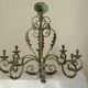 Lustre 8 branches en fer forgé patine gris de vert  et dorure ancien