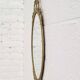 Miroir ovale ancien type médaillon sur cadre laiton