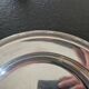 Christofle - Round service plate model Crossed Ribbons - in silver-plated metal
