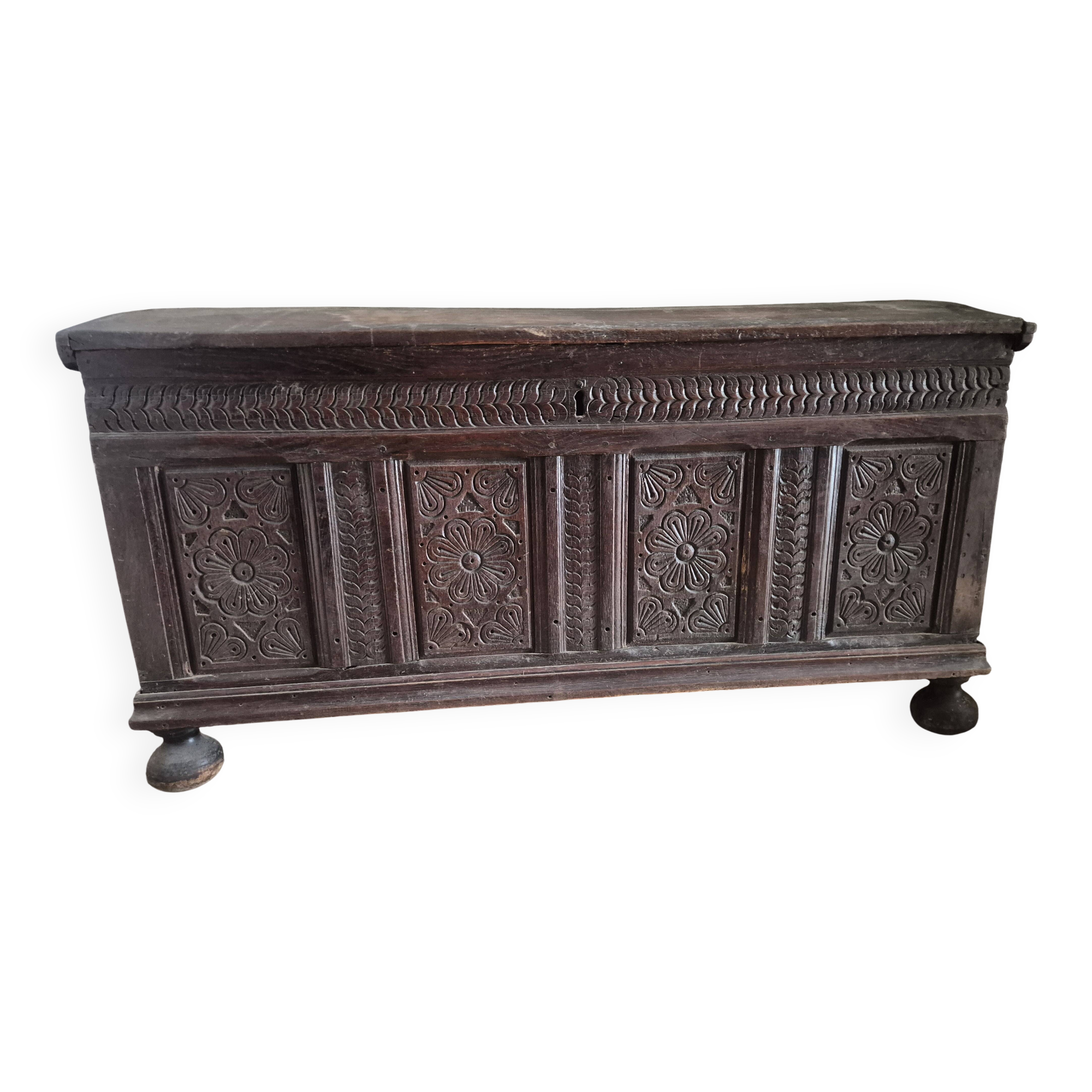 Large carved oak chest from the 17th century.