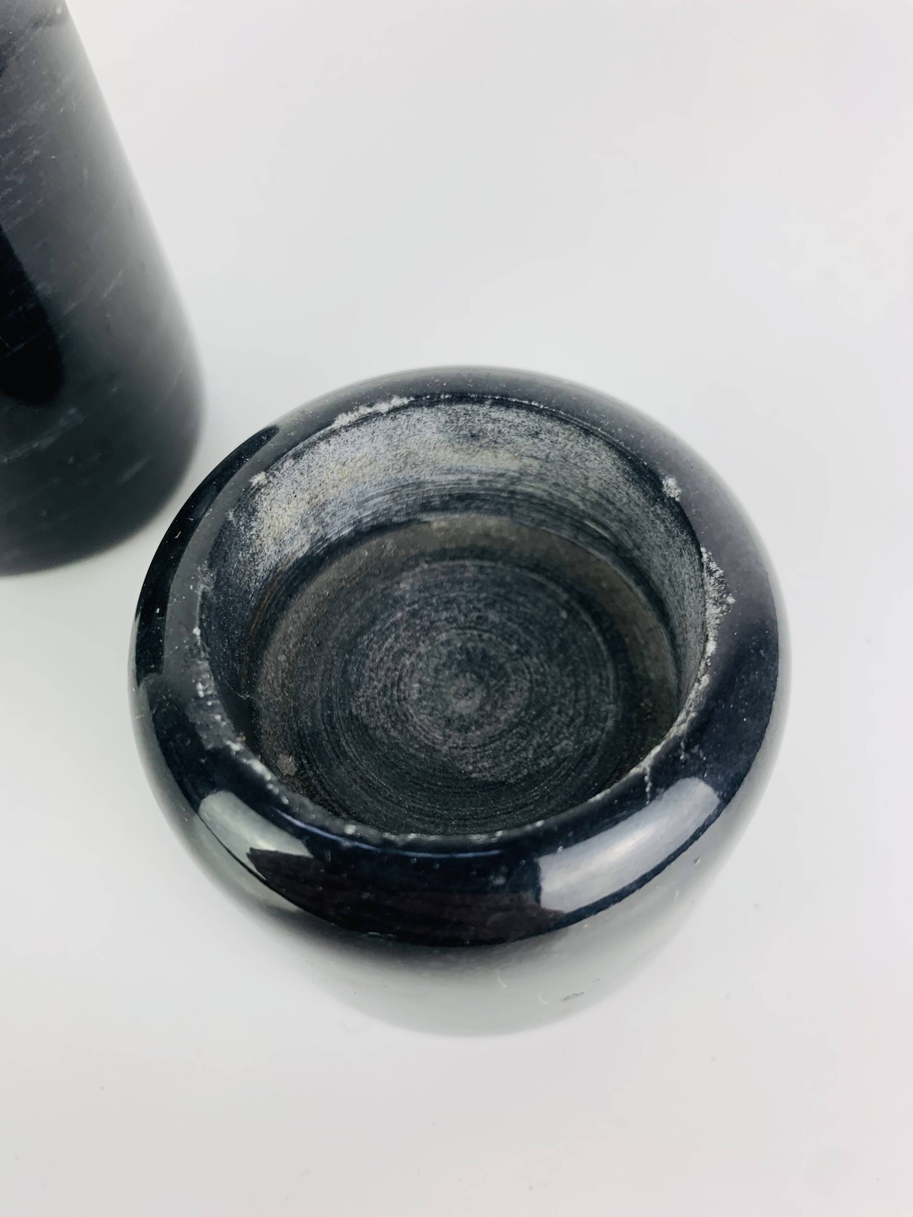 Vintage black marble candlestick trio