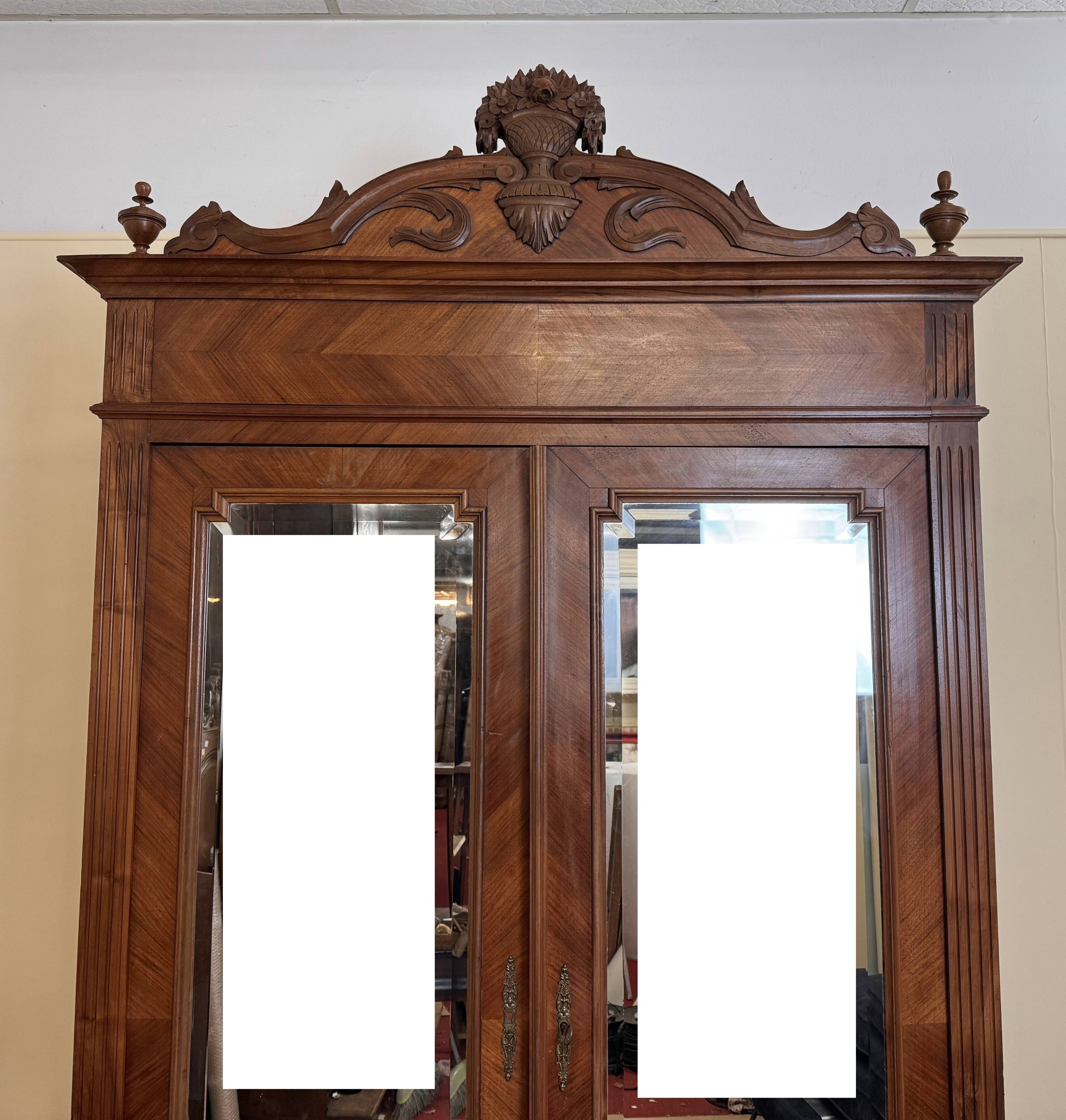 Louis XVI style mirror cabinet in walnut circa 1880