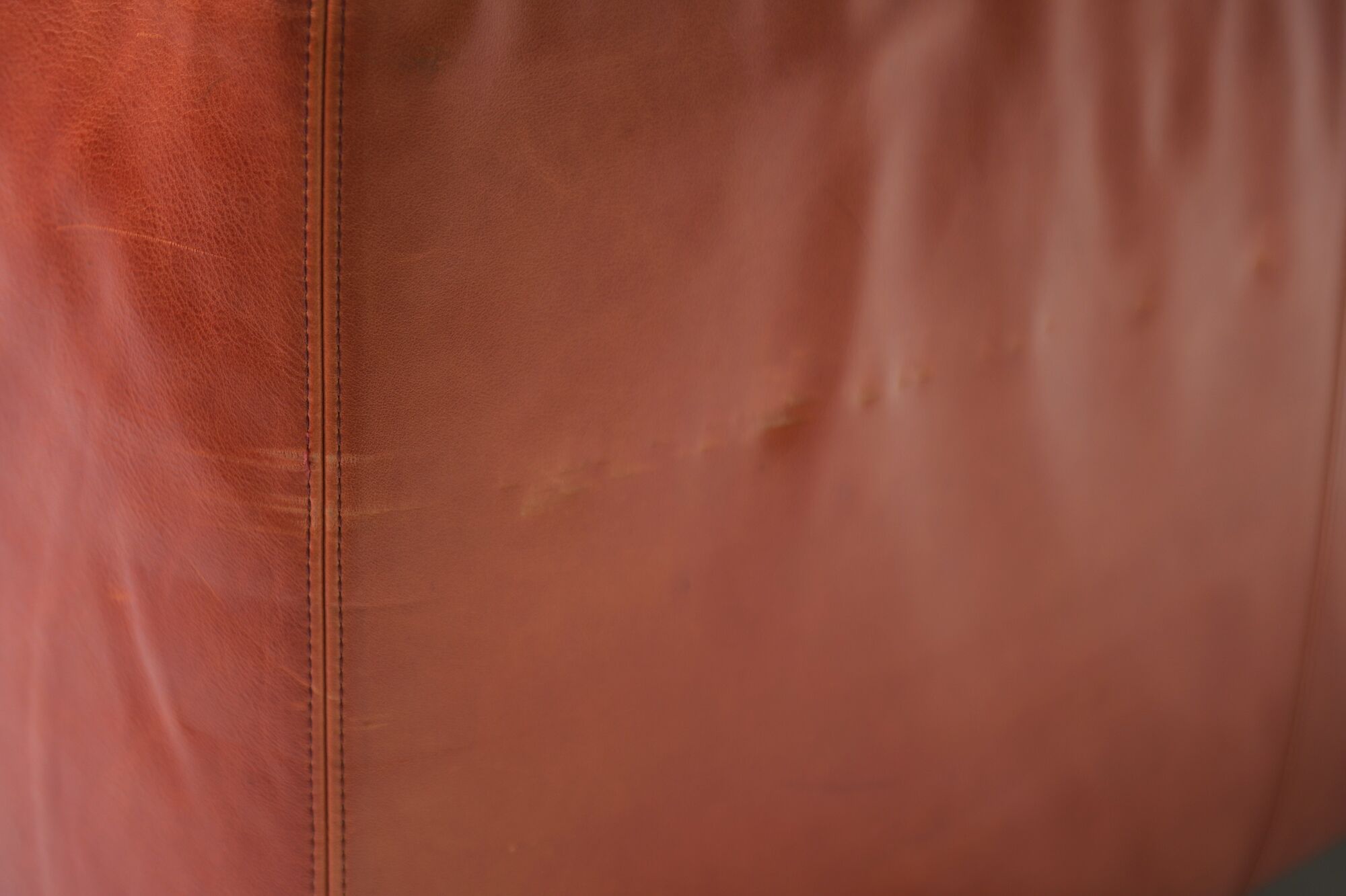 Vintage Osaka loveseat in oxblood leather by Natuzzi Italy