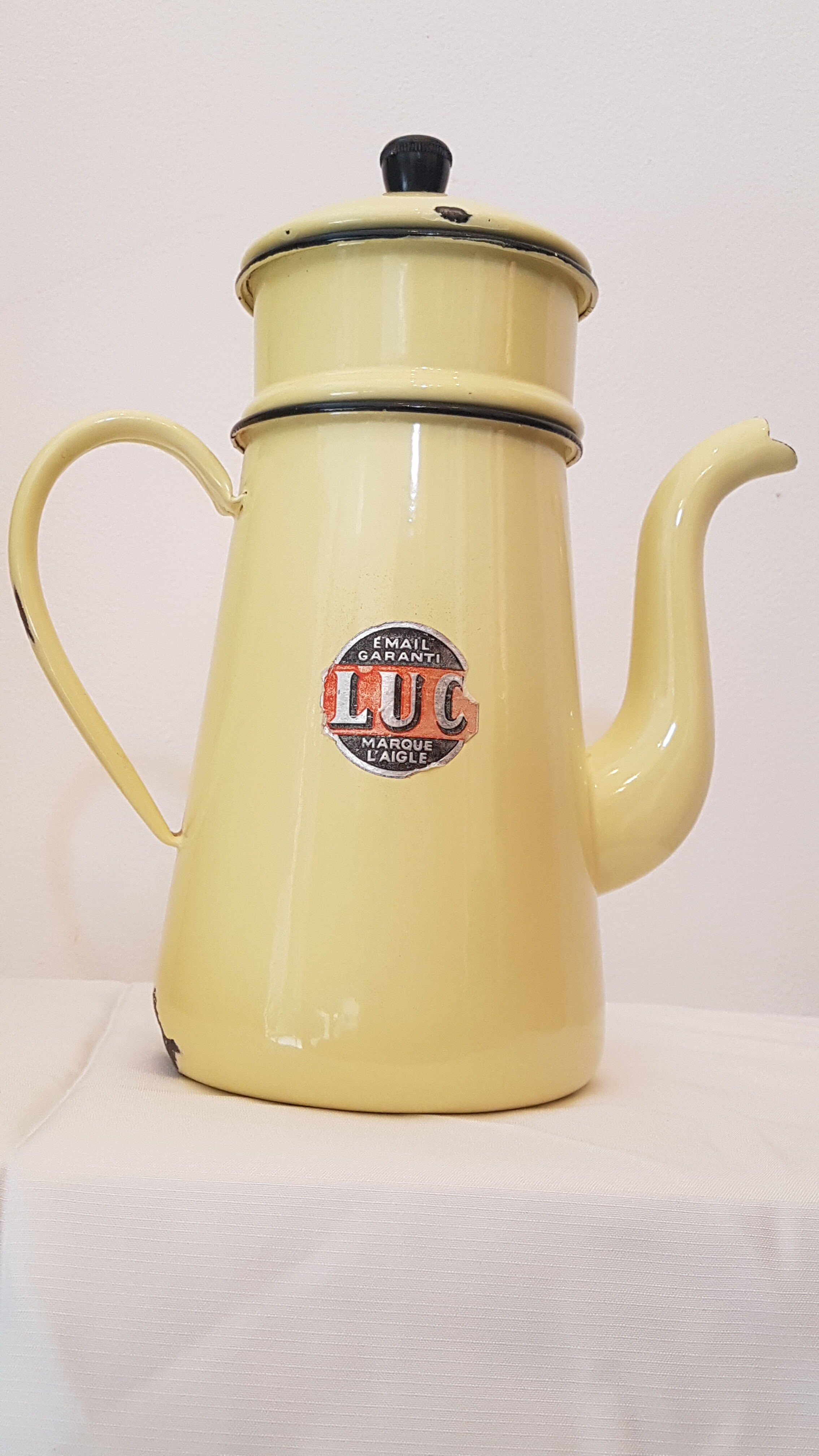 Old pale yellow enamelled coffee maker