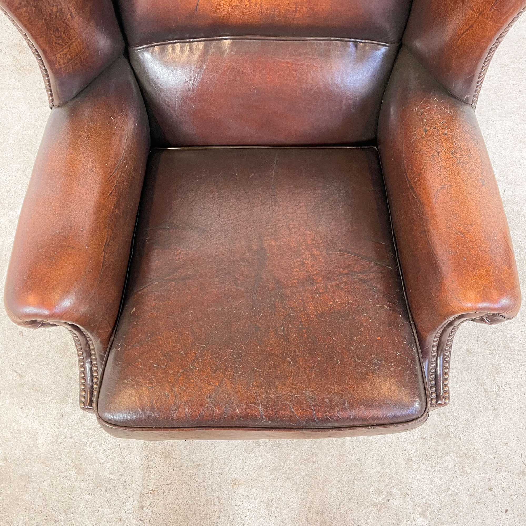 Vintage sheep leather wingback armchair london