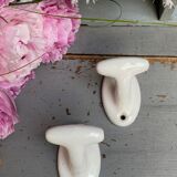 Pair of porcelain hooks