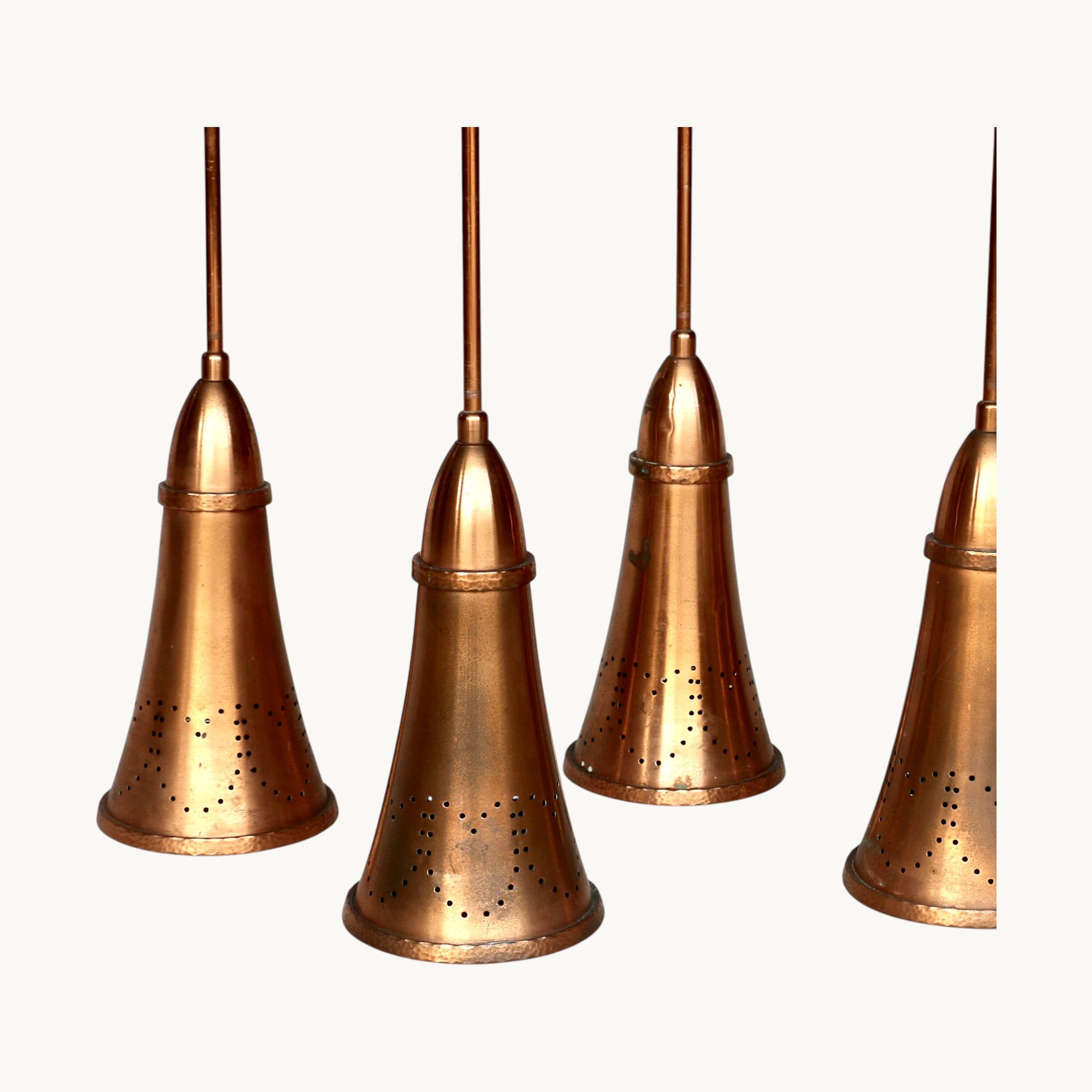 A set of 7 pendants. France 1960s.