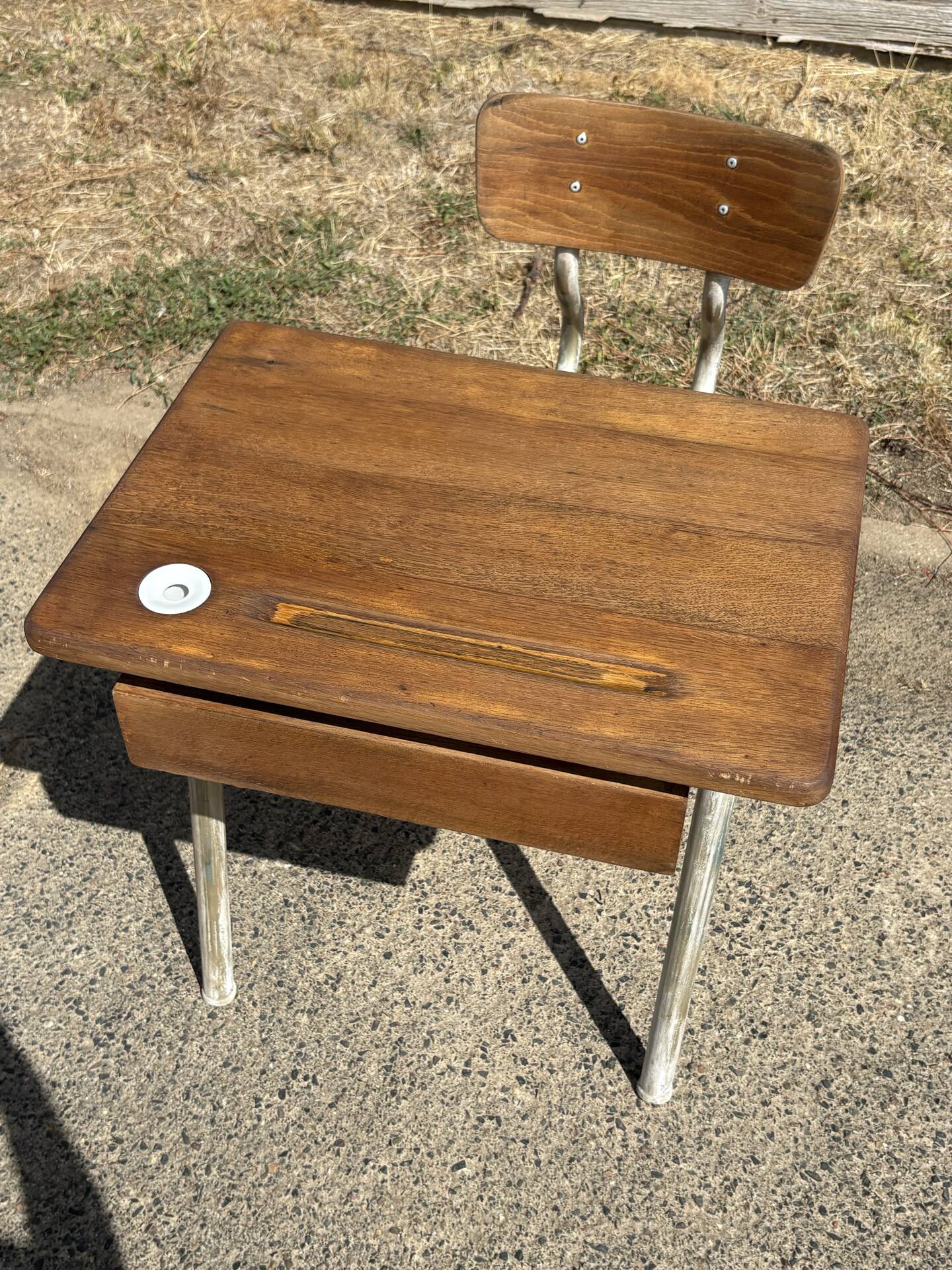 Renovated antique desk with inkwell