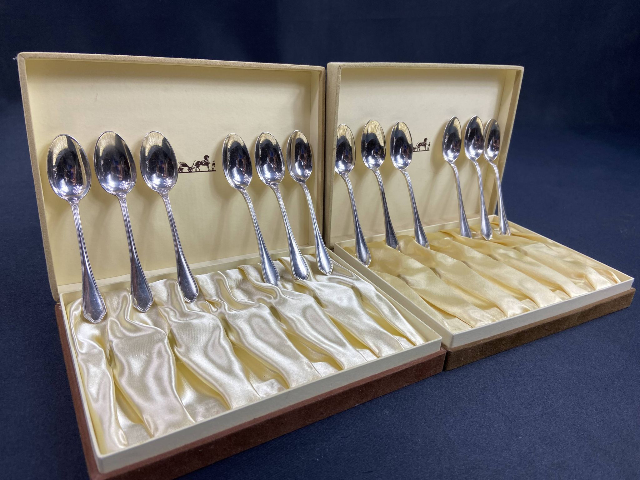 Complete set of 12 Louis XV style mocha spoons in silver-plated metal, Hermès
