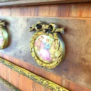 An antique French Louis XVI-style marble-top side cabinet