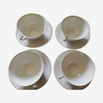 4 fine porcelain tea cups and saucers