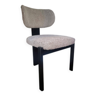 Chairs in black wood and bouclé fabric