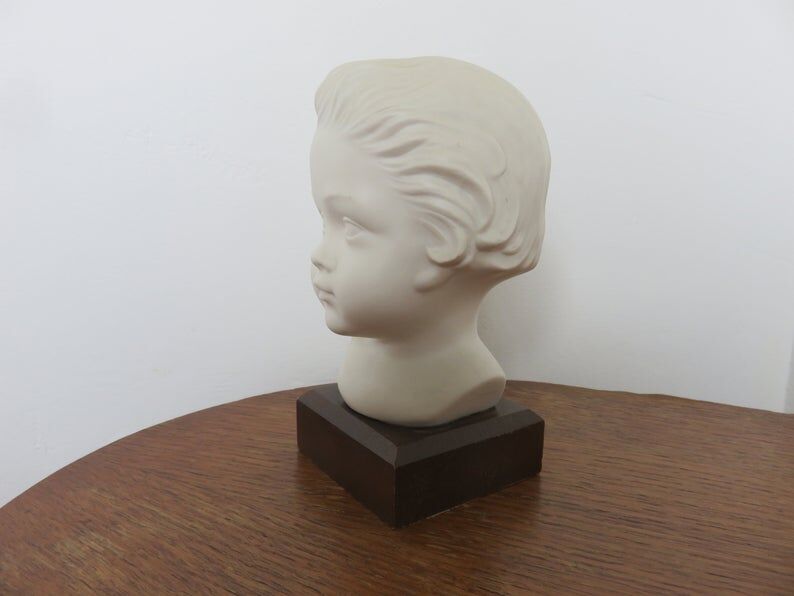 Bust " child in plaster