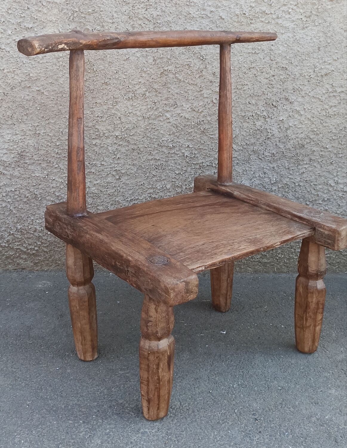 Antique wooden stool. Baoulé African art from Ivory Coast.