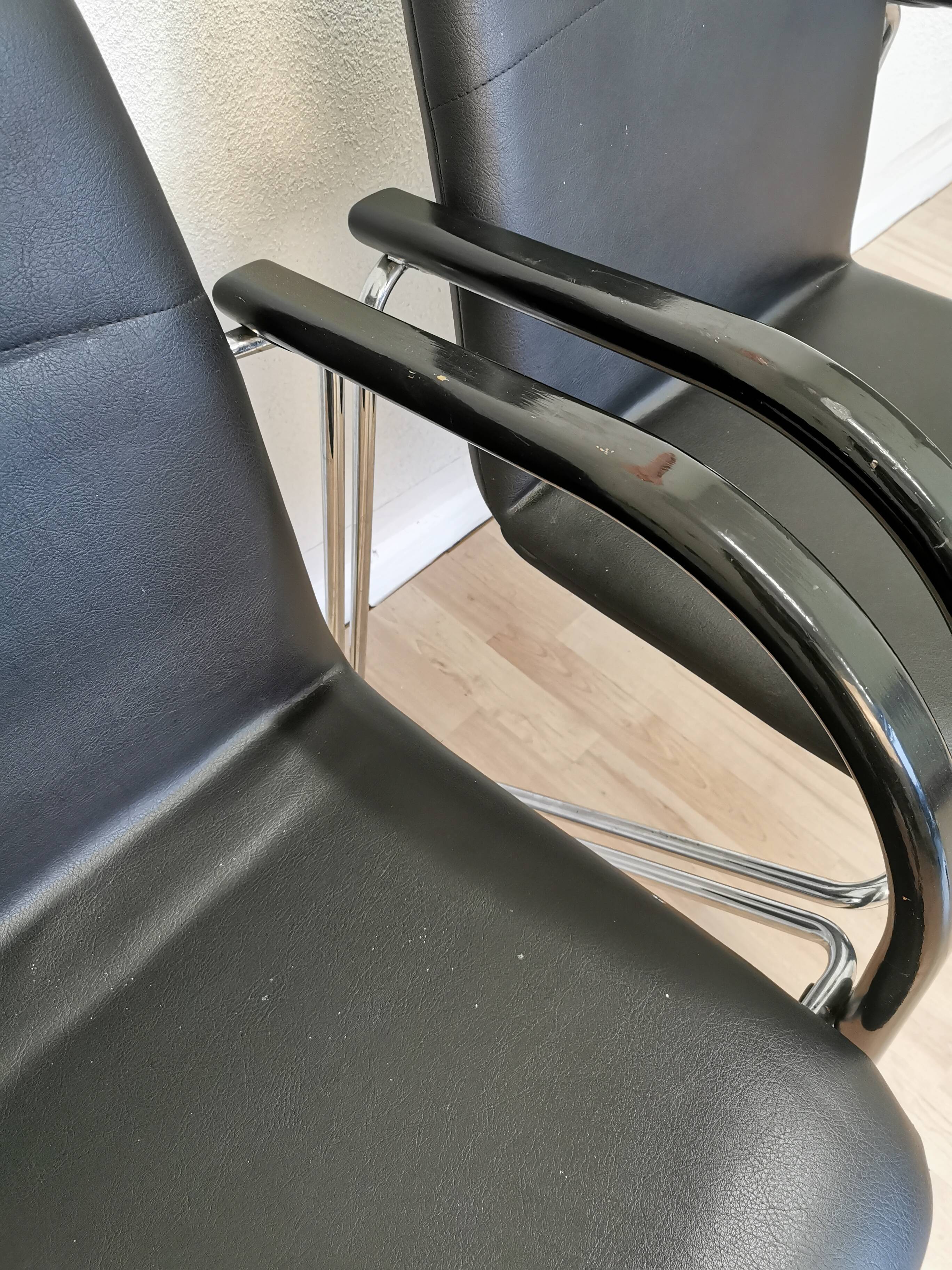 Set of 2 vintage office chairs in black leather chrome base plastic armrests / retro 1980s room