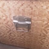 Wooden trunk with braiding
