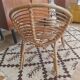 Fauteuil coquille en rotin vintage