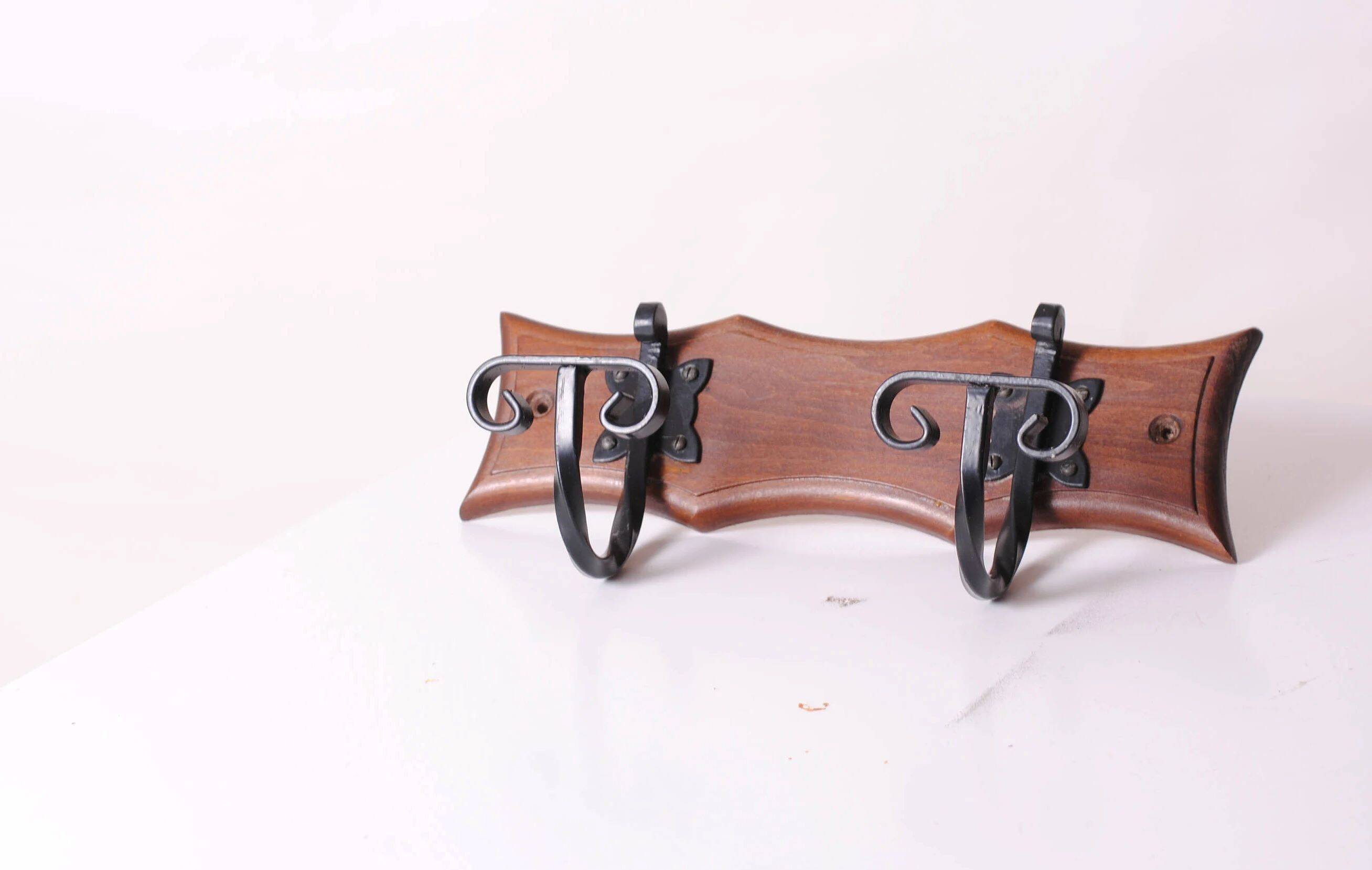 wood and wrought iron coat racks, set of two