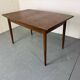 Table de salle à manger extensible en teck, style danois vintage des années 1950.