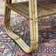 Rattan coffee table and caned shelf from the 1970s.