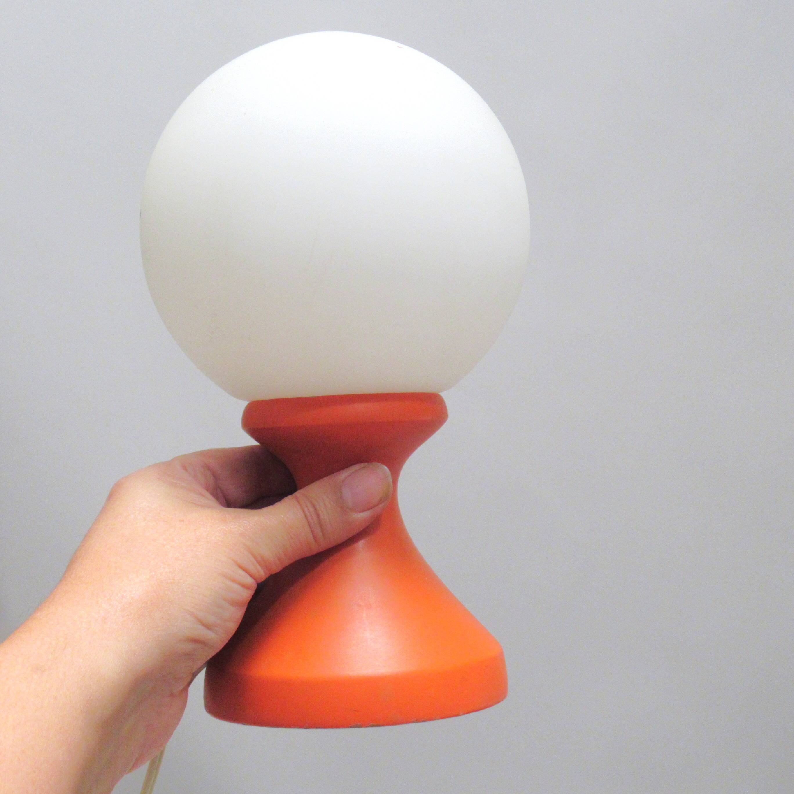 Small 1970s orange tulip-shaped ball lamp on a stand