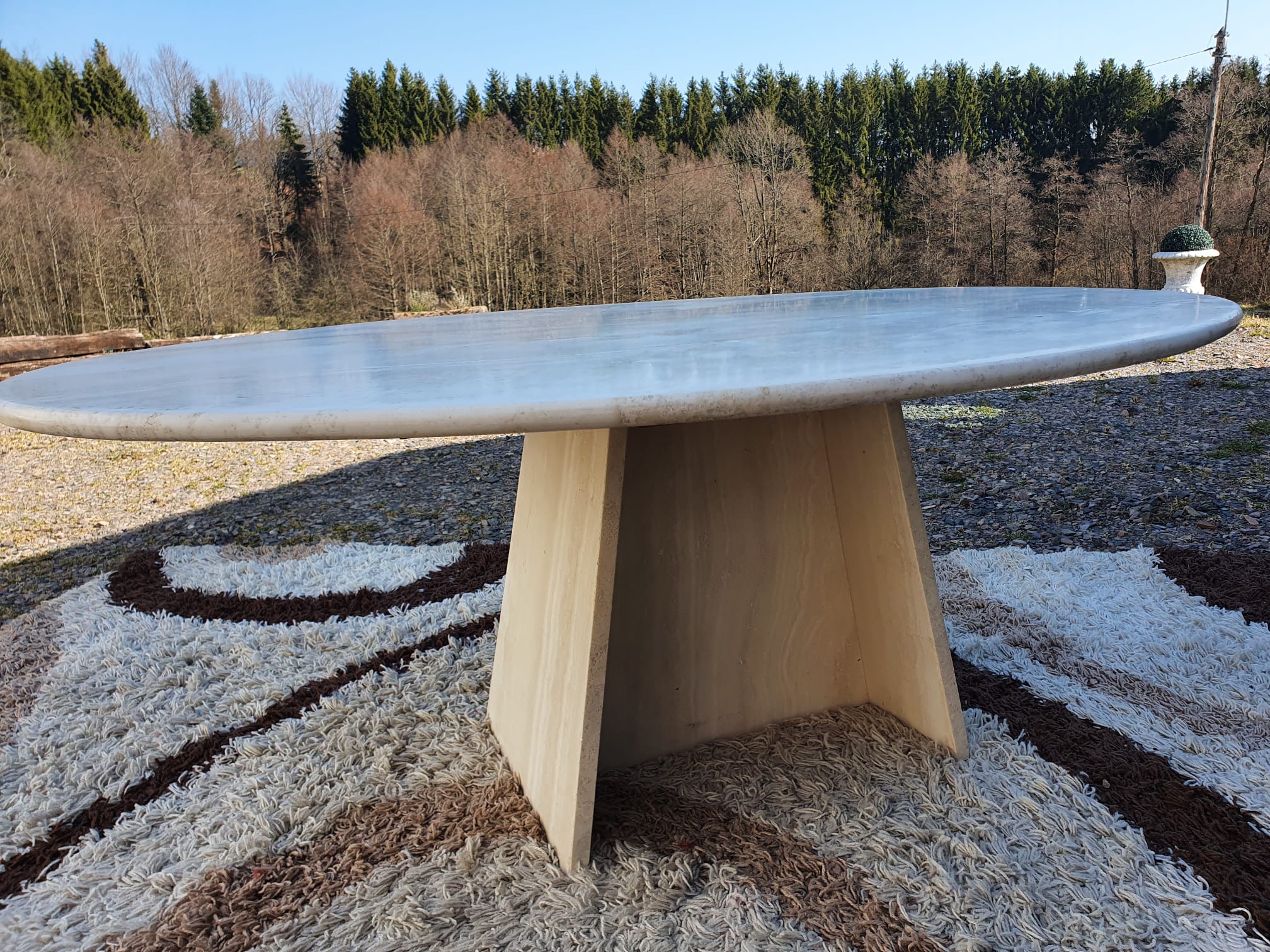 Oval travertine coffee table