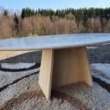 Oval travertine coffee table