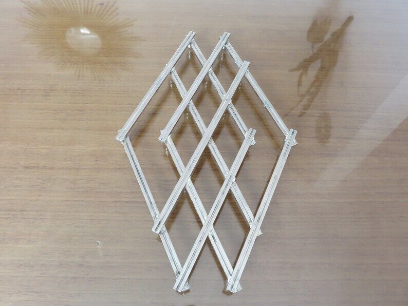 Extendable silver metal underside 40s 50s