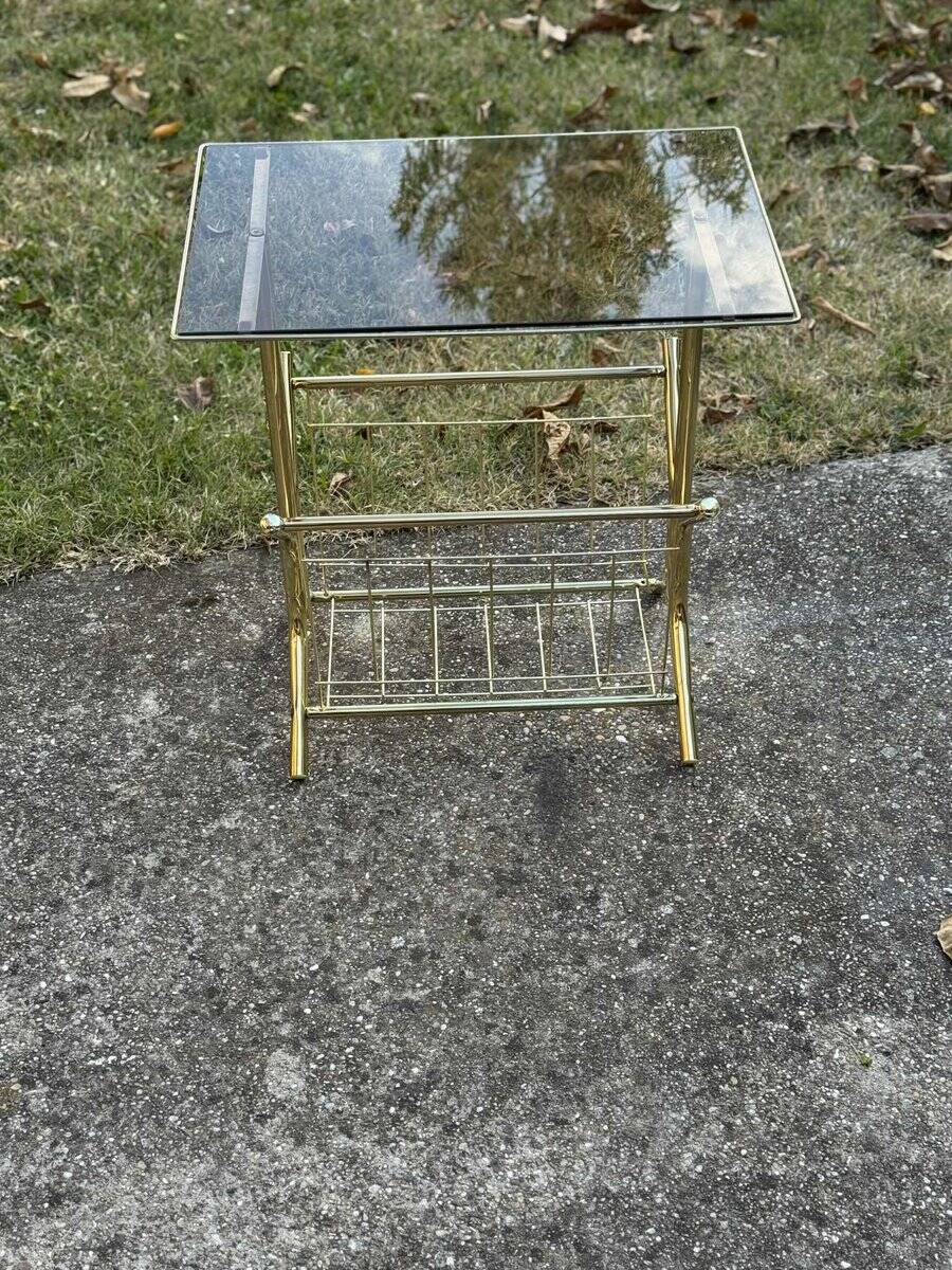Mid-century modern brass and smoked glass side table with integrated magazine holder, 1970s