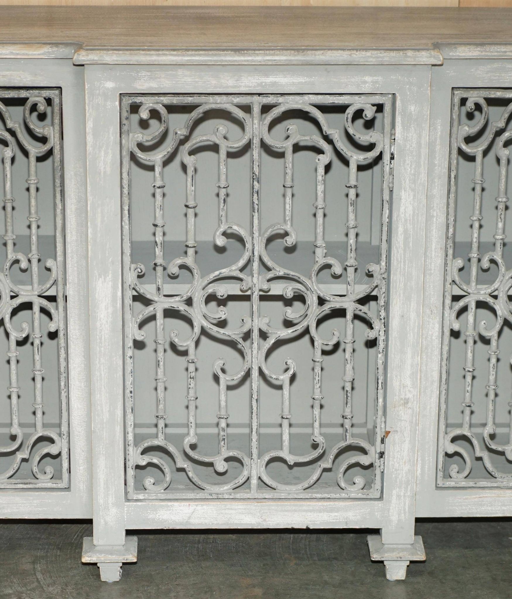 Vintage sideboard with wrought iron doors