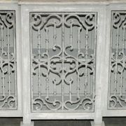 Vintage sideboard with wrought iron doors