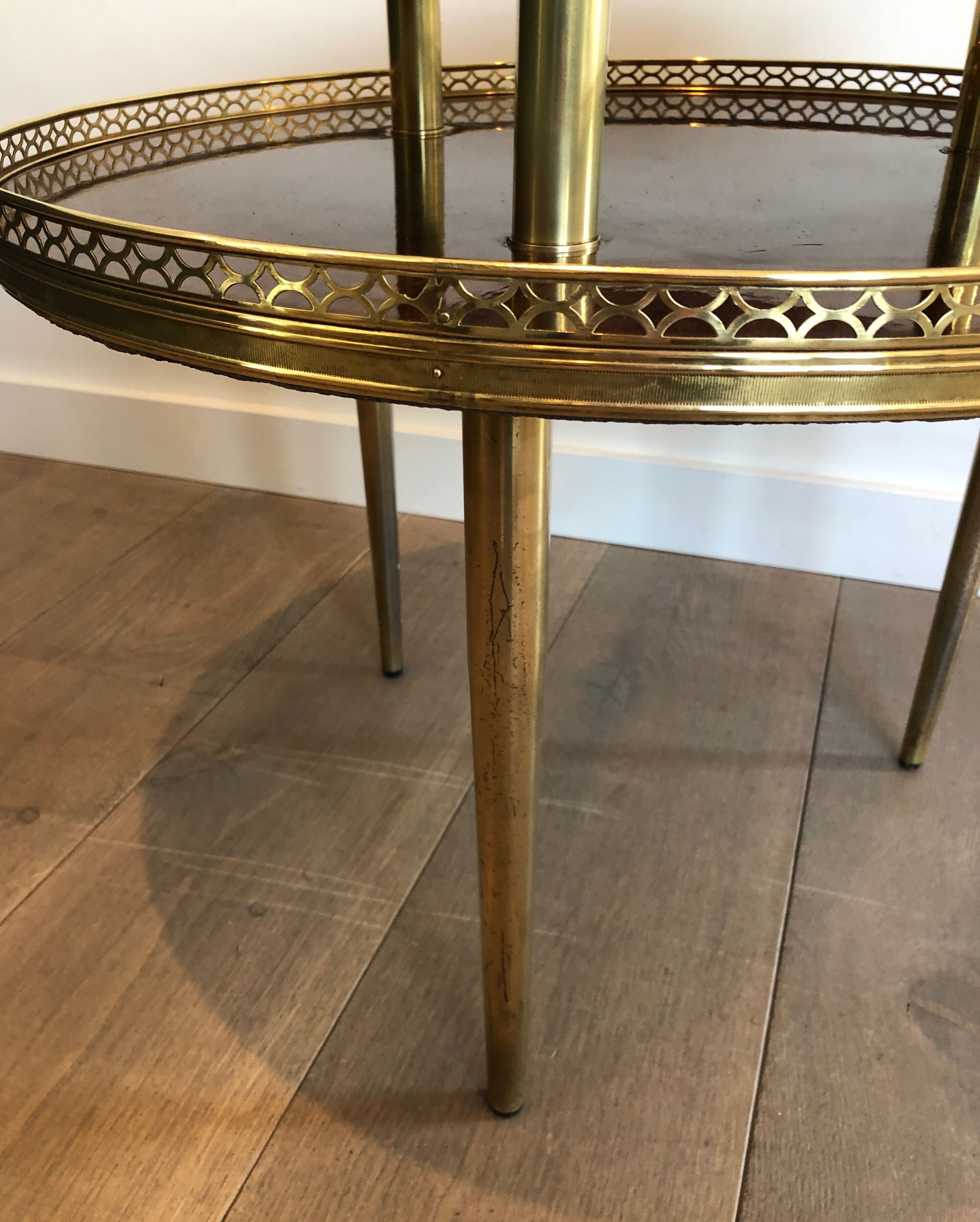 Neoclassical style tripod pedestal in mahogany, brass