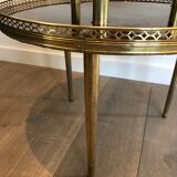 Neoclassical style tripod pedestal in mahogany, brass