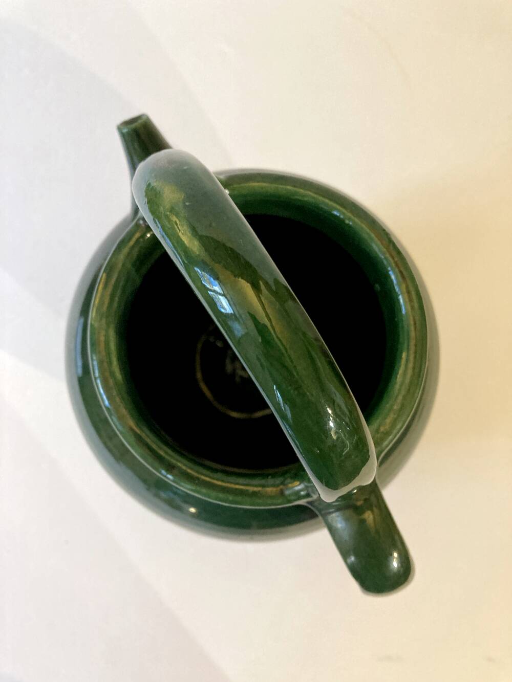 Emerald green glazed terracotta goat jug