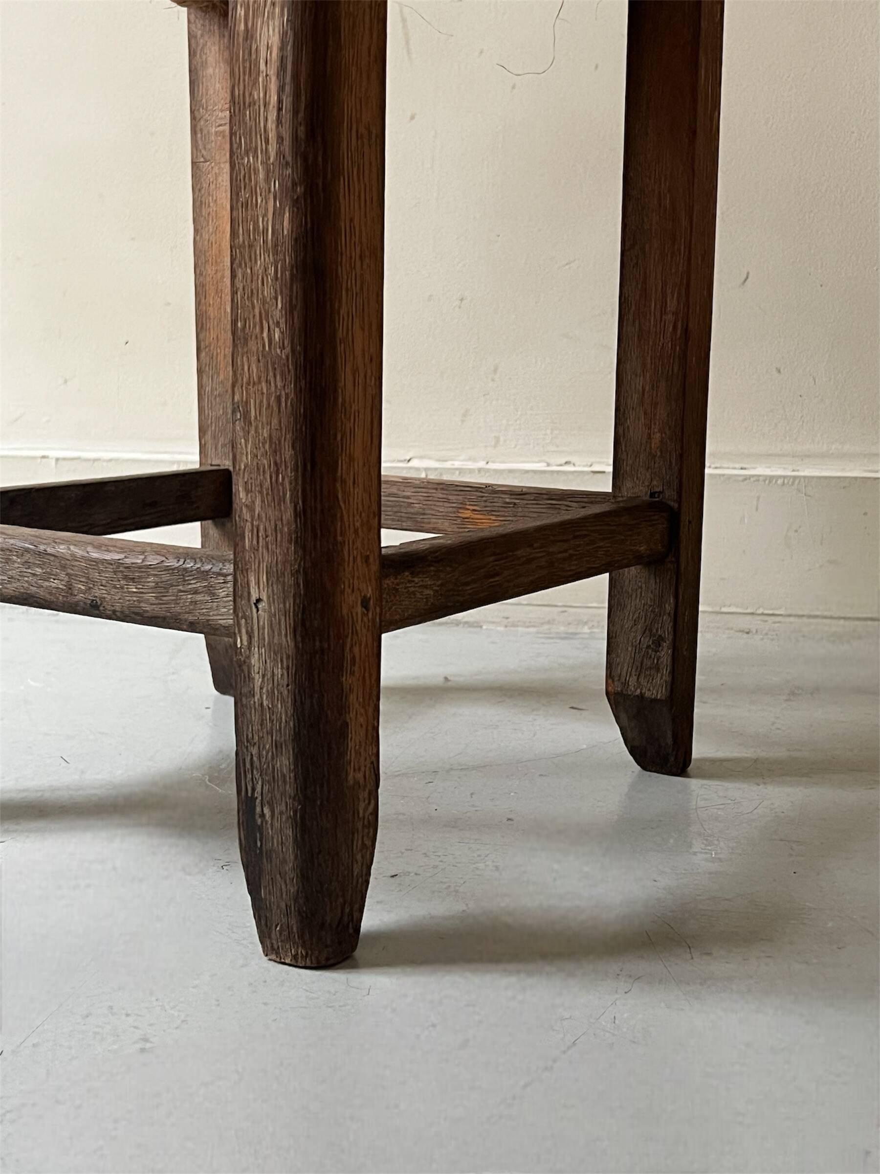 Solid oak stool with woven hemp seat by Audoux Minnet.