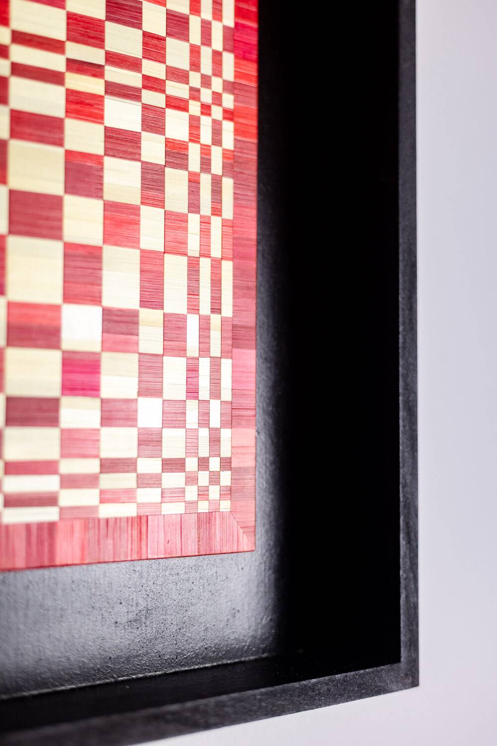 Pair of panels in red and gold straw marquetry. Contemporary.