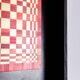 Pair of panels in red and gold straw marquetry. Contemporary.