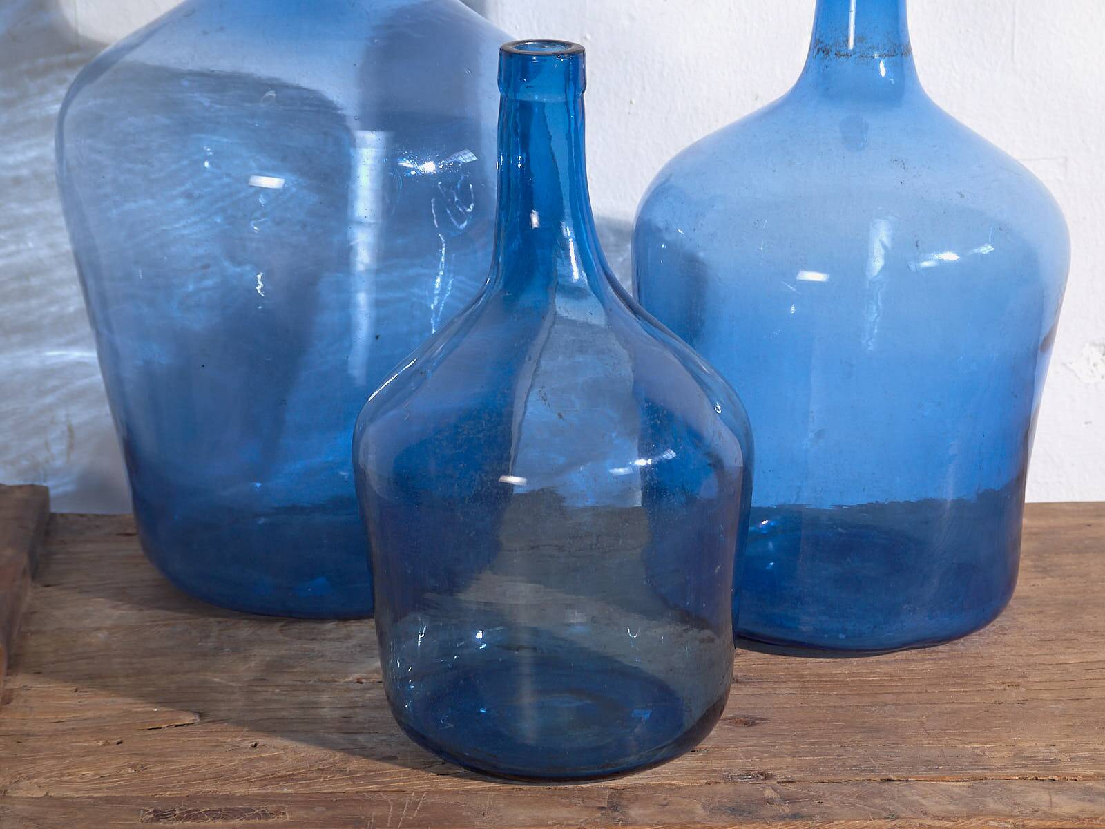 Antique blue demijohns (circa 1920). 3-piece set #1