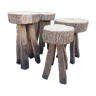 4 stools in raw wood brutalist art