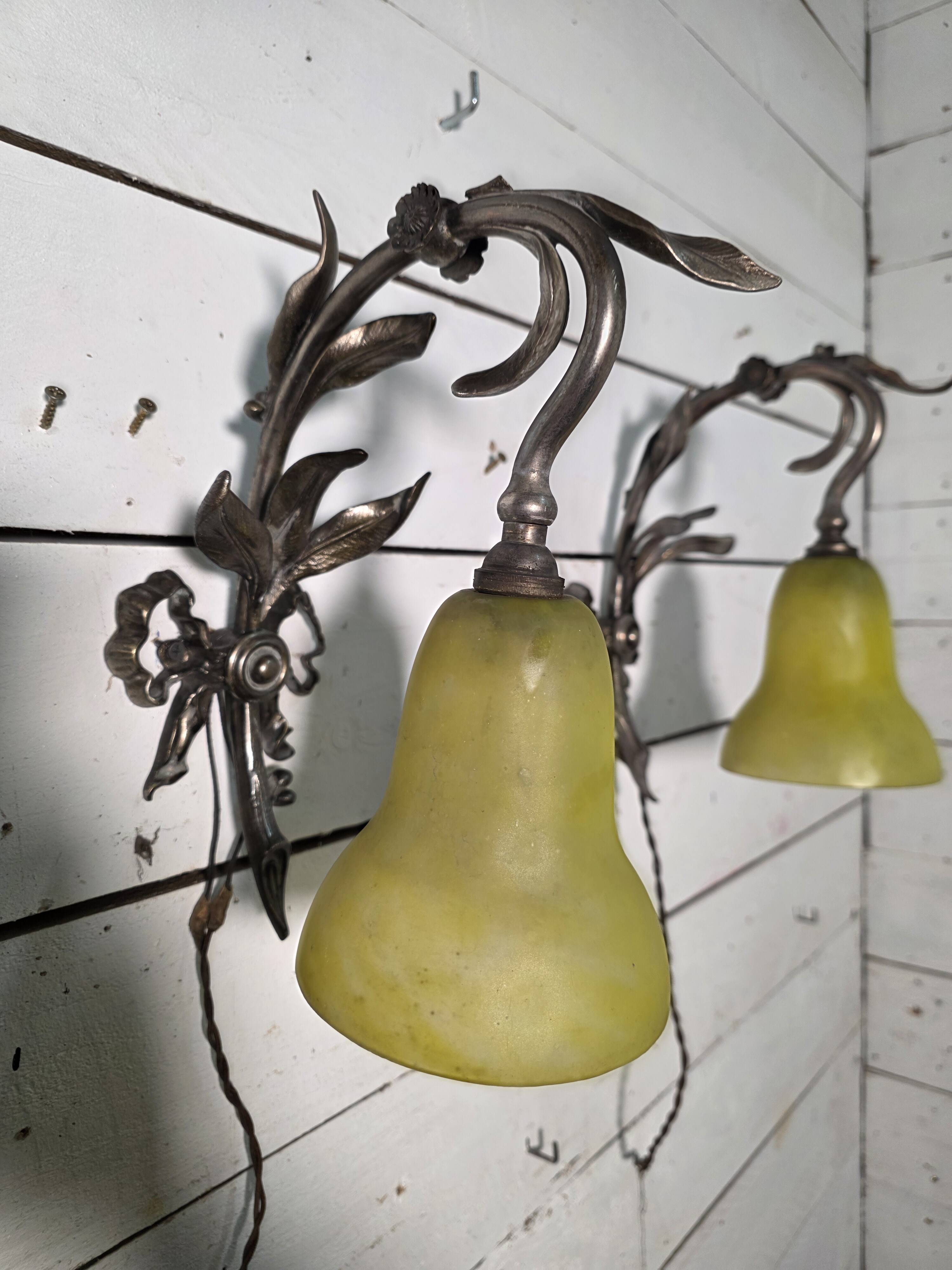 Pair of Louis XVI style bronze wall sconces